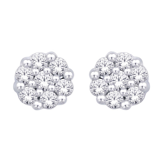 Oro blanco de 14 quilates de 1/3 quilates total. Aretes con forma de flor de diamantes