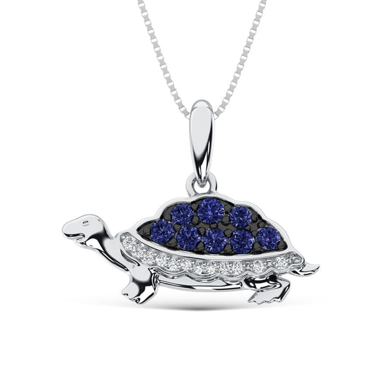 Colgante de tortuga de oro blanco de 14 quilates con diamantes de 1/5 qt.Tw y diamantes azules