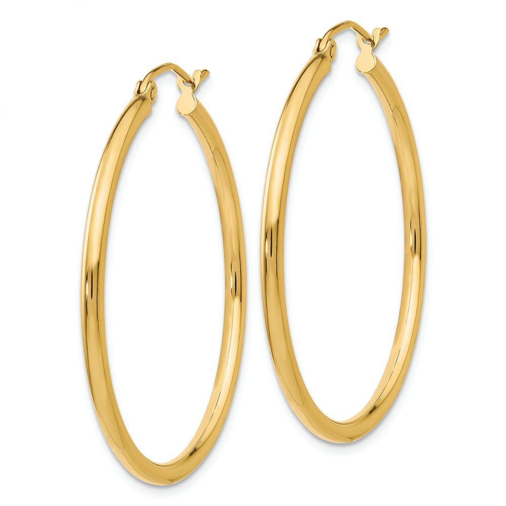 Aretes tipo argolla de tubo de 2 x 35 mm, pulidos de 14 k