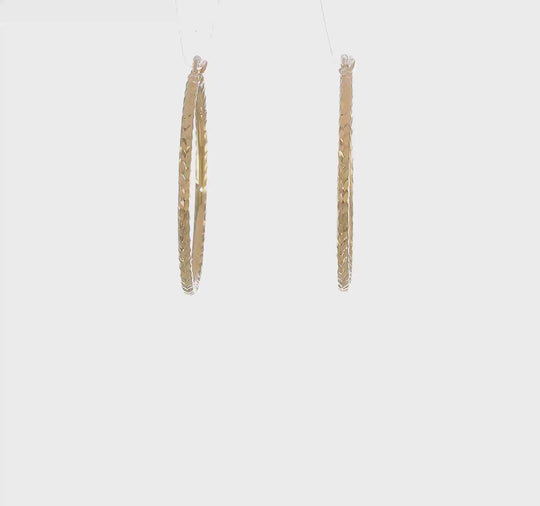 Pendientes de Aro Tubo Redondo de Oro Amarillo de 10K con Corte Diamante de 2 mm